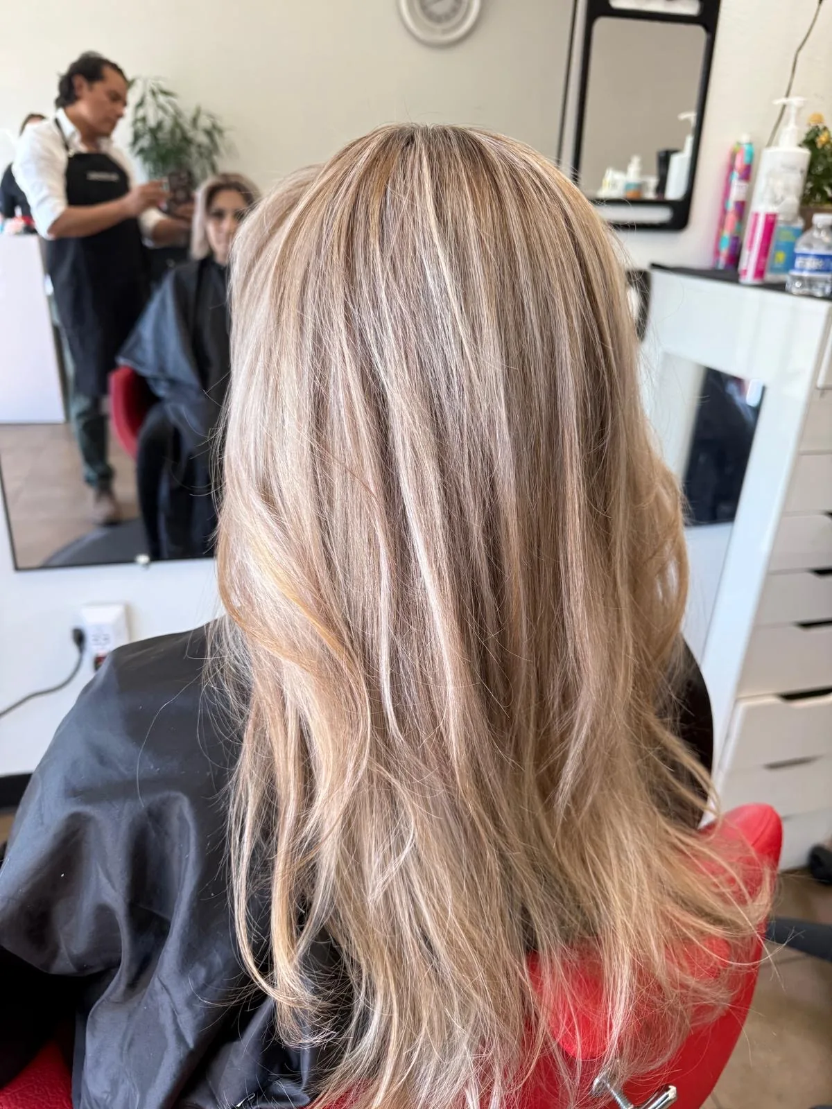 Long blonde highlights with natural dimension